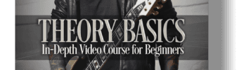 Dee Dammers, music instructor, holding electric guitar for "Theory Basics" video course.