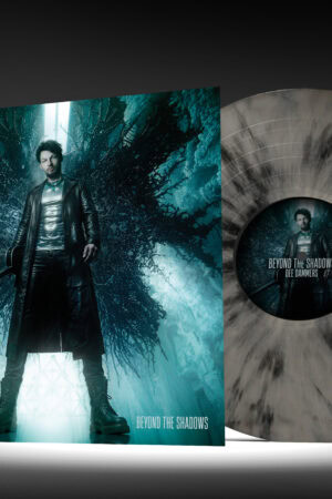 Dee Dammers' "Beyond the Shadows" vinyl with limited Bone & Black Marble pattern, featuring dark, atmospheric artwork and exclusive design.